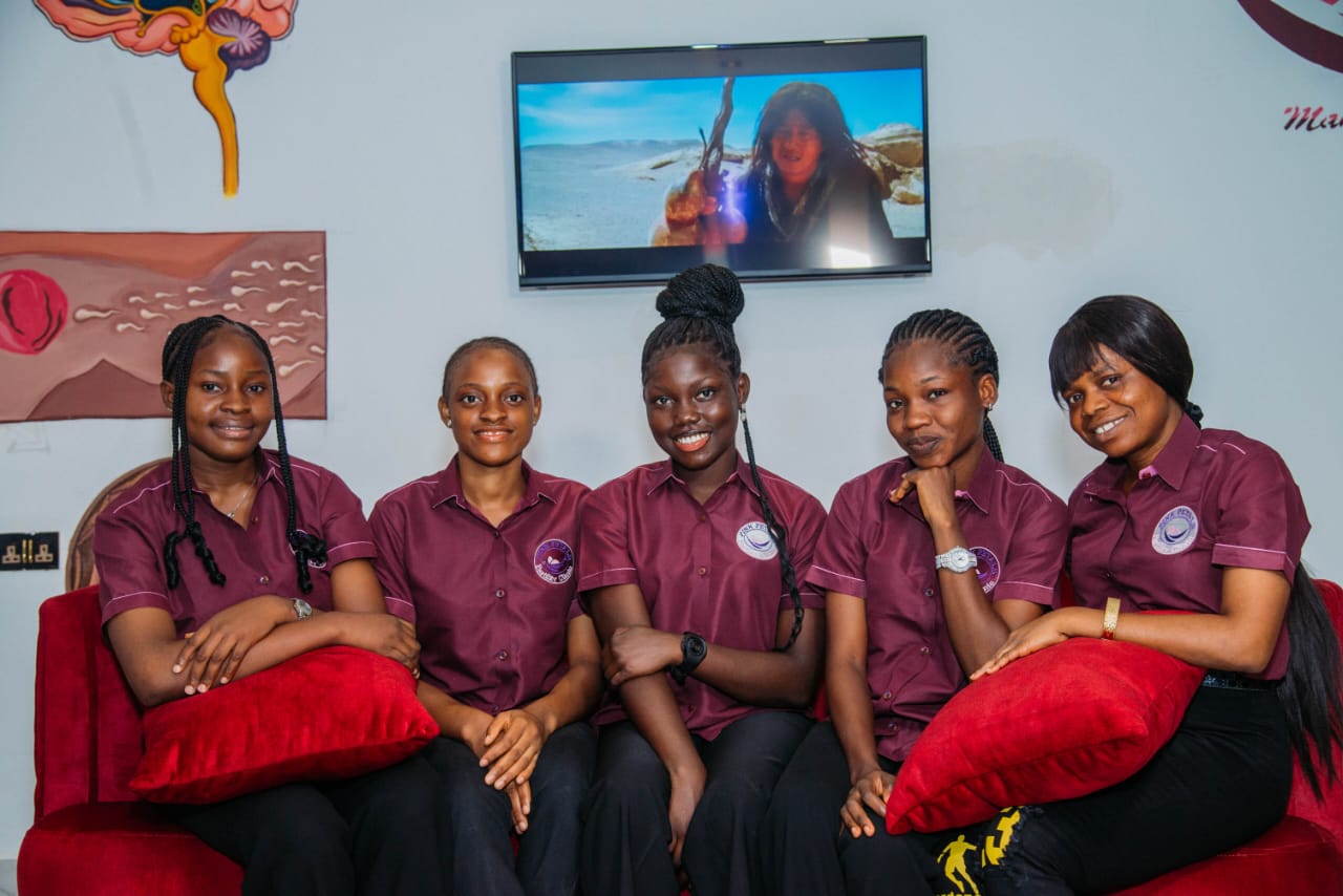 The Pink Petals nursing and patient-care team in branded uniforms